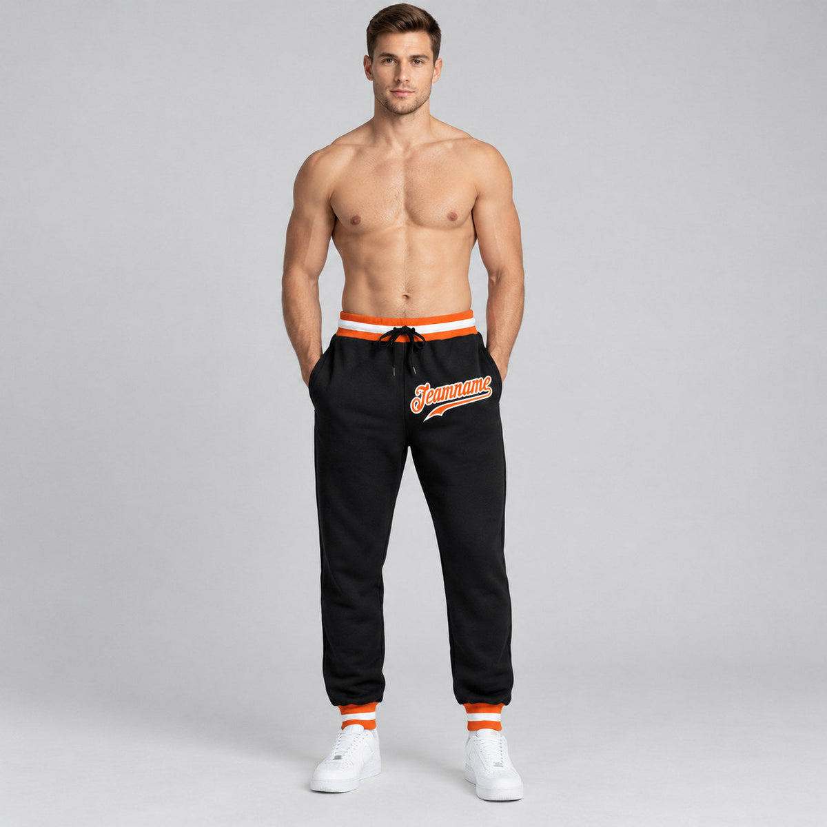 Custom Black Pants with Orange and White Accents worn by male model