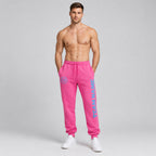 Custom Pink Fleece Jogger Sweatpants with Light Blue Accents worn by male model