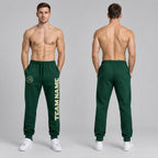 Custom Green Fleece Jogger Sweatpants with Cream Accents worn by male model