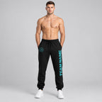 Custom Black Fleece Jogger Sweatpants with Aqua Accents worn by male model