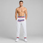 Custom White and Royal Pinstripe Pants with Royal and Red Accents worn by male model