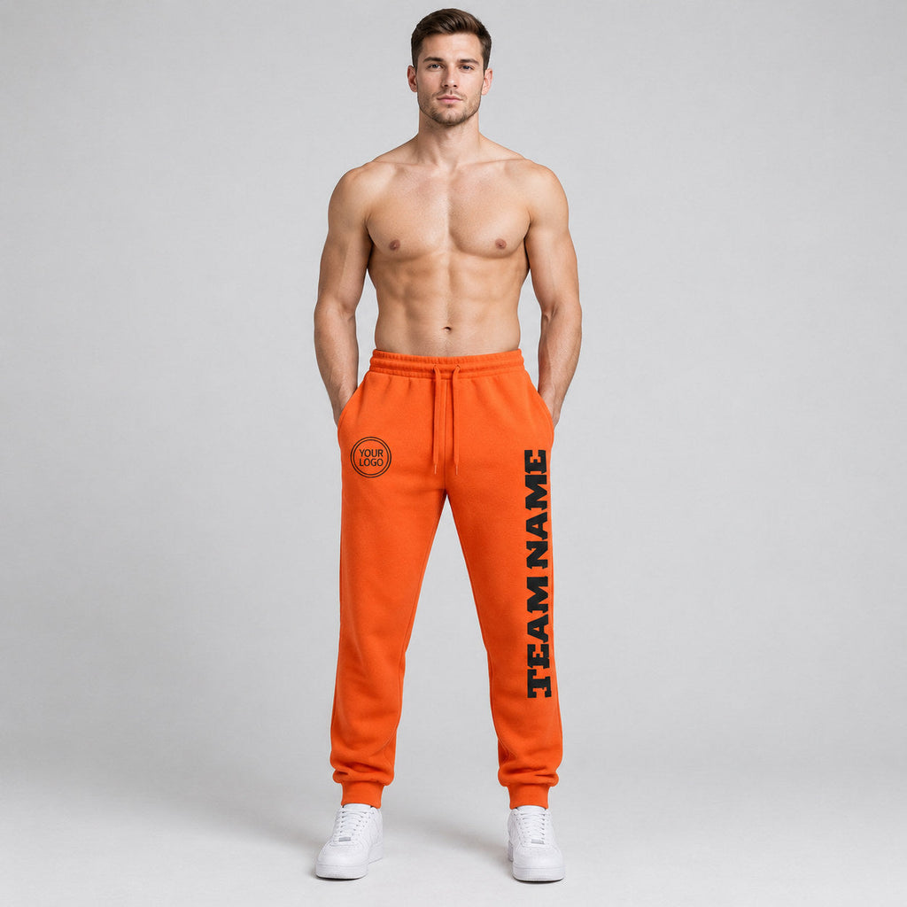 Custom Orange Fleece Jogger Sweatpants with Black Accents worn by male model