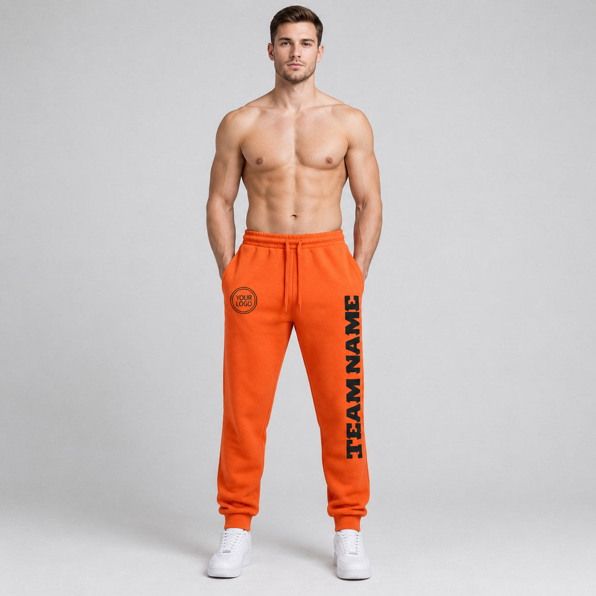 Custom Orange Fleece Jogger Sweatpants with Black Accents worn by male model