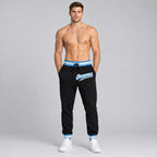 Custom Black Pants with Light Blue and White Accents worn by male model