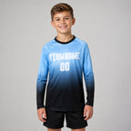 Custom Light Blue Fade Long Sleeve Sublimated Soccer Jersey with White and Black Lettering youth size worn by child model