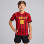 Custom Red Sublimated Soccer Jersey with Gold Lettering Design 0220 youth size worn by child model