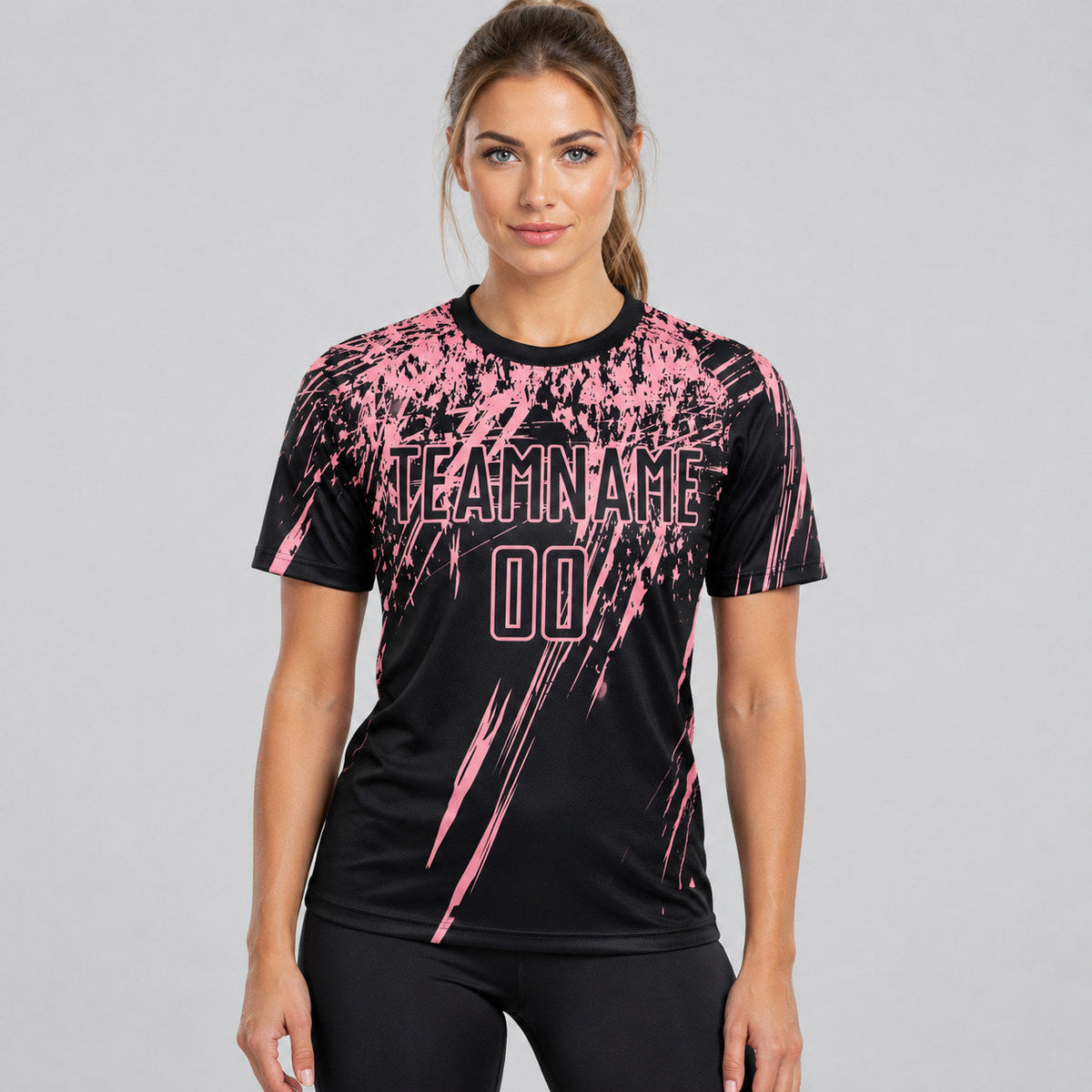 Custom Black Sublimated Soccer Jersey with Medium Pink Lettering worn by female model