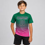 Custom Kelly Green Fade Pinstripe Sublimated Soccer Jersey with Pink Lettering youth size worn by child model