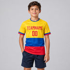 Custom Gold Ecuador Flag Sublimated Soccer Jersey with Red and Royal Lettering youth size worn by child model