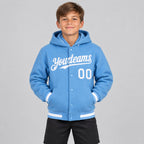 Custom Light Blue Full Snap Bomber Hooded Varsity Jacket with White Accents youth size worn by child model