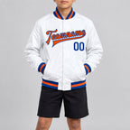 Custom White Full Snap Bomber Faux Leather Varsity Jacket with Orange and Royal Accents youth size worn by child model