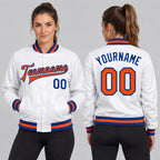 Custom White Full Snap Bomber Faux Leather Varsity Jacket with Orange and Royal Accents worn by female model
