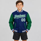 Custom Royal Full Snap Bomber Two Tone Varsity Jacket with Kelly Green and White Accents Design 3540 youth size worn by child model