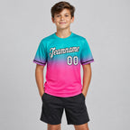 Custom Aqua Fade Performance T-Shirt with Pink and Black Lettering youth size worn by child model
