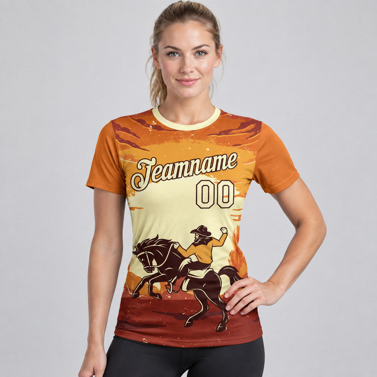 Custom Orange Cowboy Rodeo Performance T-Shirt with City Cream and Brown Lettering worn by female model