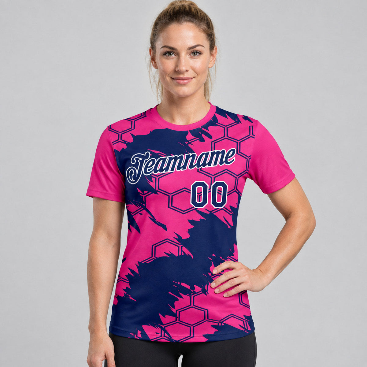 Custom Hot Pink Esports T-Shirt with Navy and White Lettering worn by female model