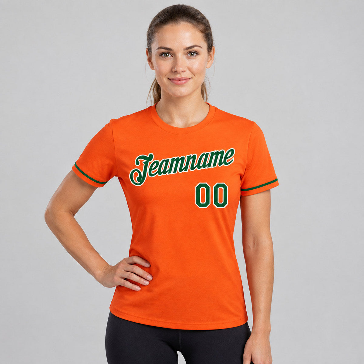 Custom Orange Performance T-Shirt with Green and White Lettering worn by female model