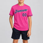 Custom Pink Performance T-Shirt with Navy and White Lettering youth size worn by child model
