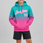 Custom Aqua Fade Pullover Hoodie with White and Pink Lettering youth size worn by child model