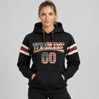 Custom Black Vintage USA Flag Football Pullover Hoodie with City Cream and Crimson Lettering worn by female model