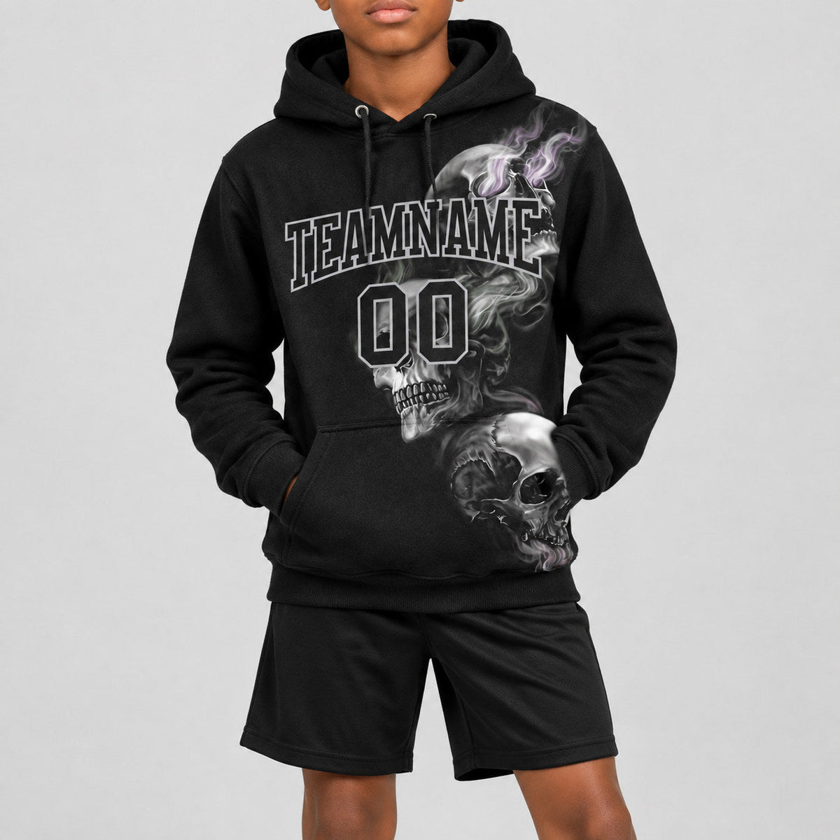 Custom Black Skull Pullover Hoodie with Gray Lettering youth size worn by child model
