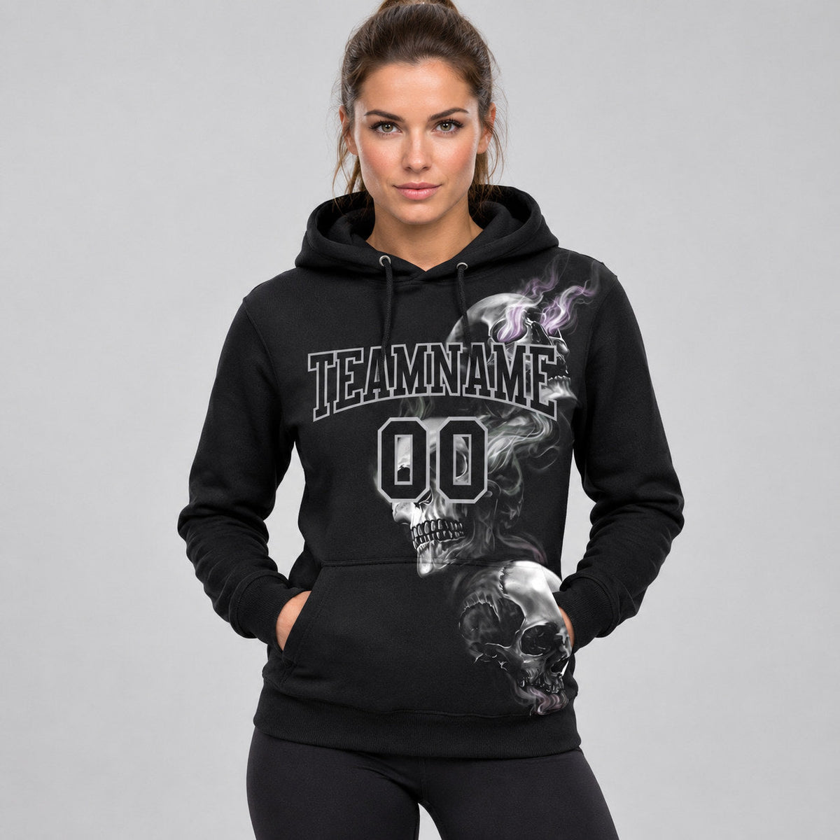 Custom Black Skull Pullover Hoodie with Gray Lettering worn by female model