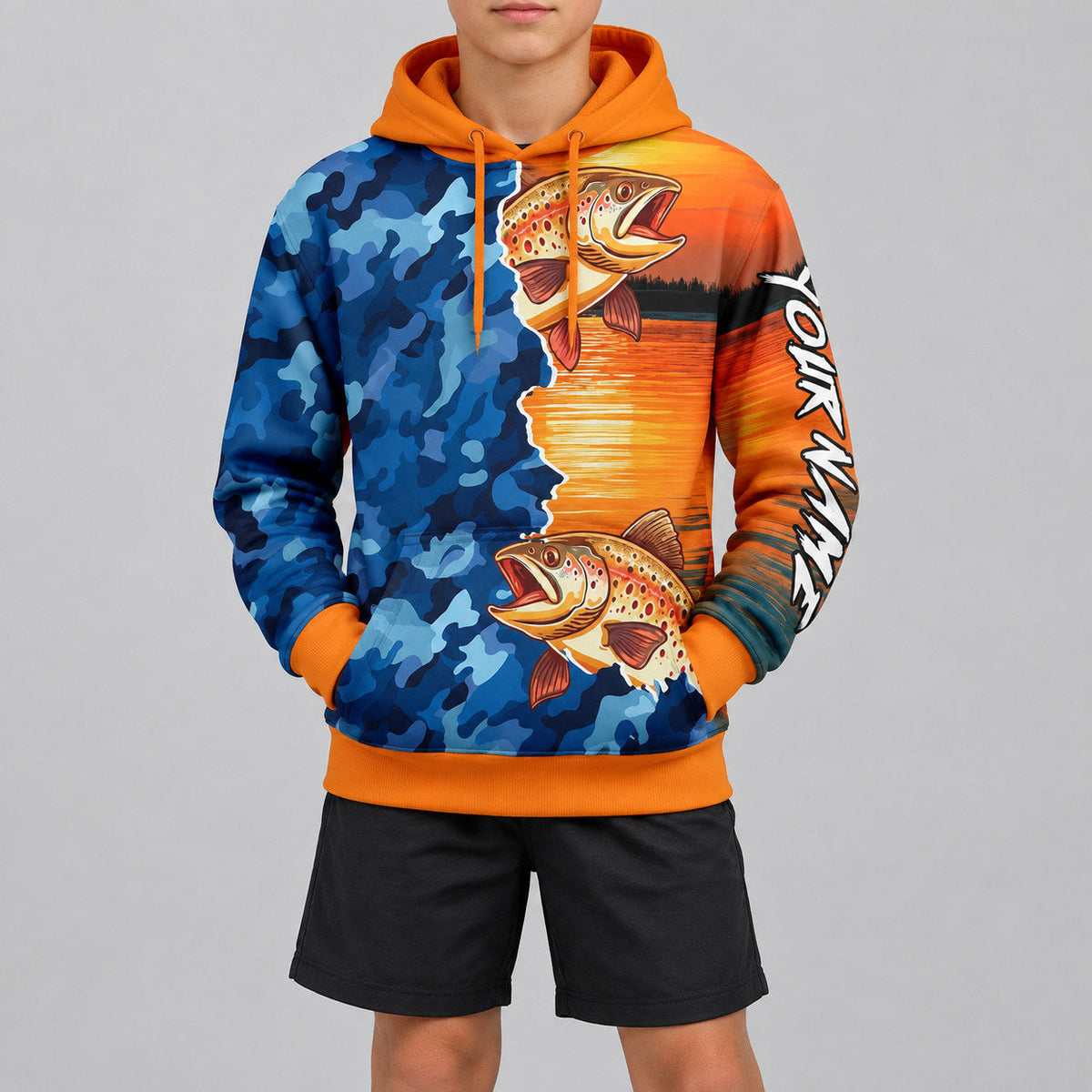 Custom Bay Orange Camo Trout Fish Fishing Pullover Hoodie with Black Lettering youth size worn by child model