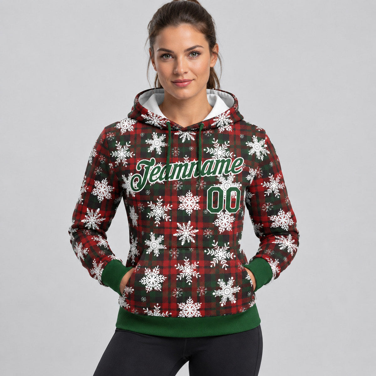 Custom Red Christmas Plaid And Snow Pullover Hoodie with Green and White Lettering worn by female model