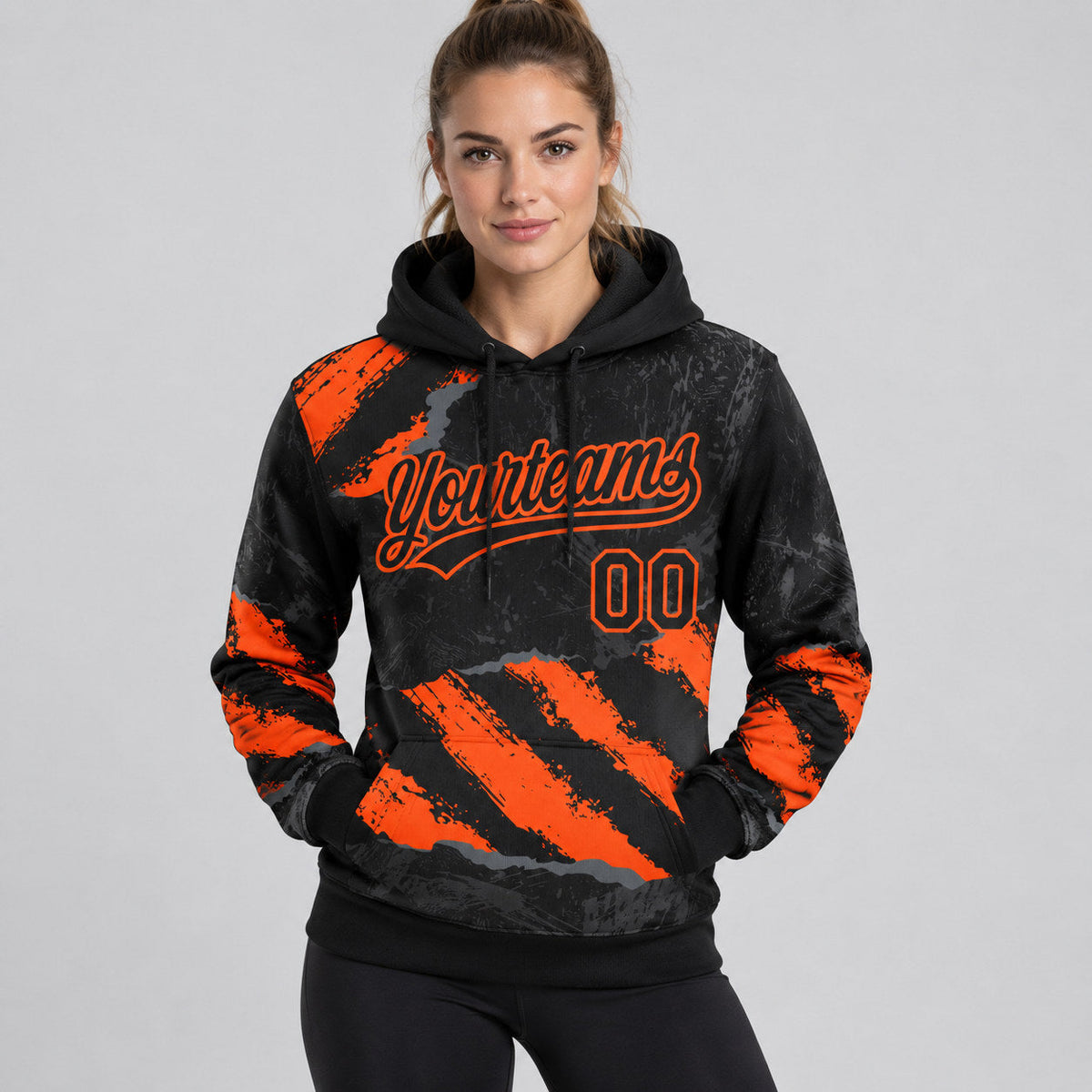 Custom Black Splash Pullover Hoodie with Orange and Steel Gray Lettering worn by female model