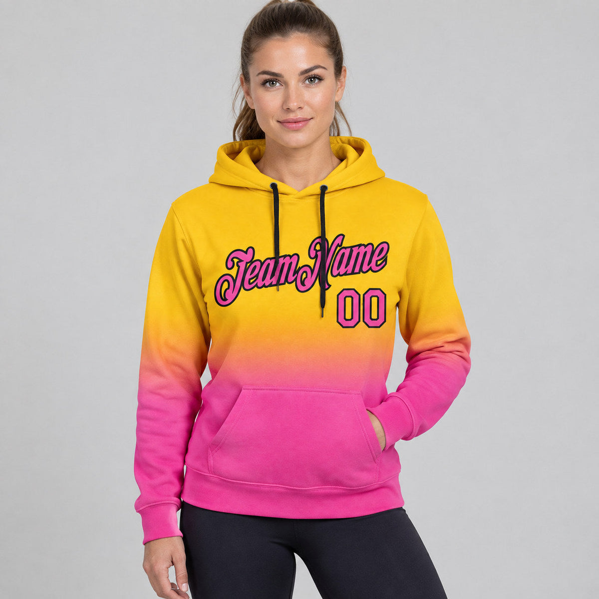 Custom Yellow Fade Pullover Hoodie with Pink and Black Lettering worn by female model