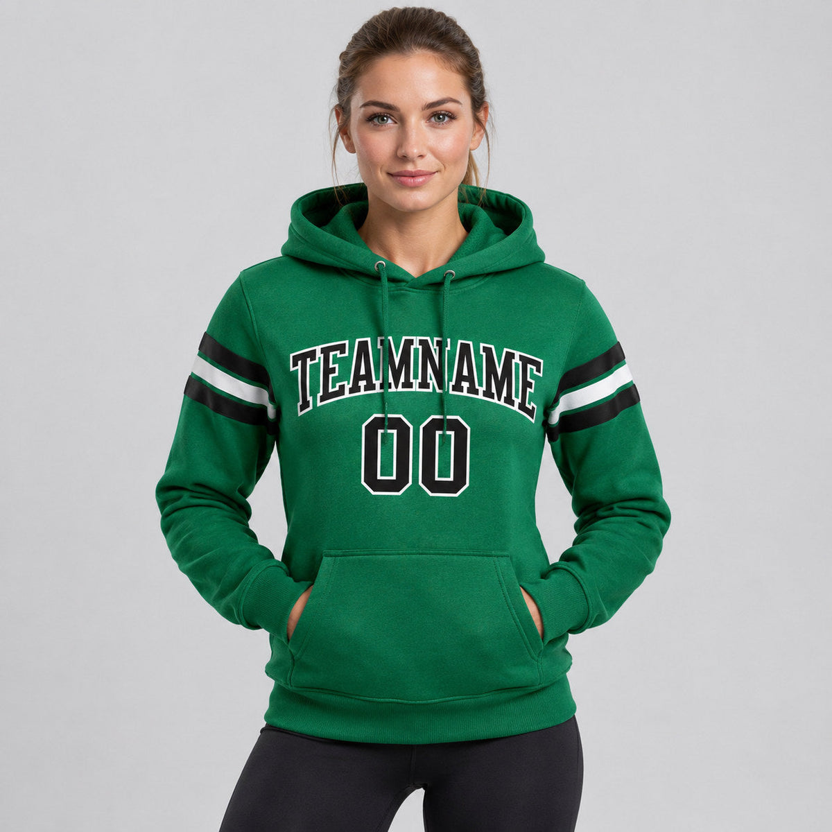 Custom Kelly Green Football Pullover Hoodie with Black and White Lettering worn by female model