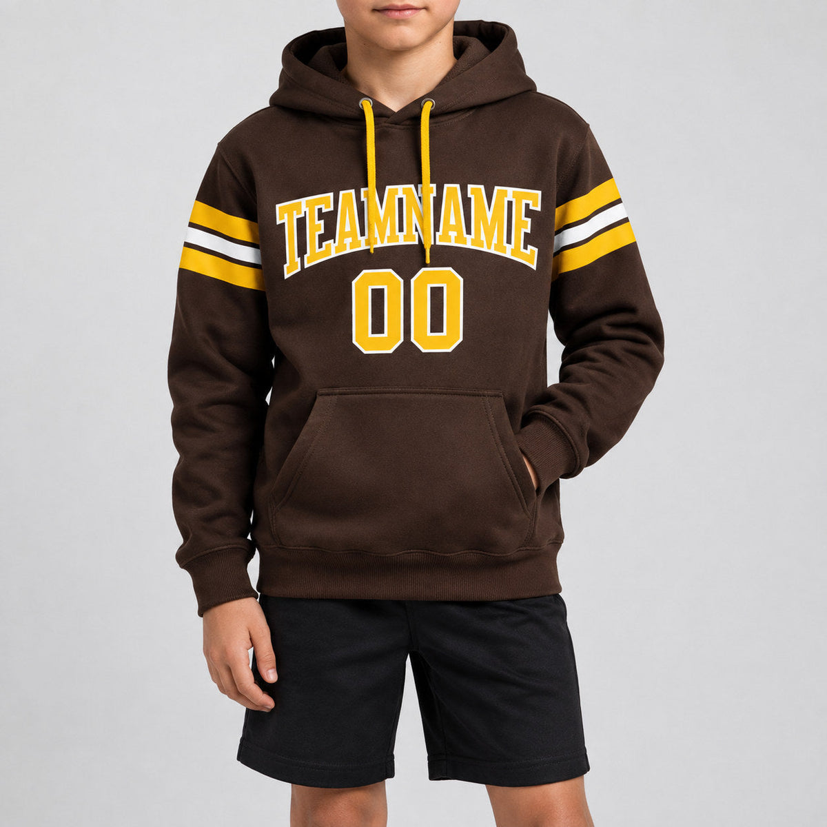 Custom Brown Football Pullover Hoodie with Gold and White Lettering youth size worn by child model