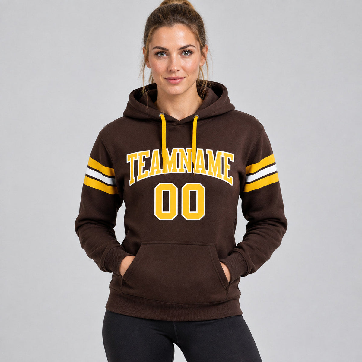 Custom Brown Football Pullover Hoodie with Gold and White Lettering worn by female model