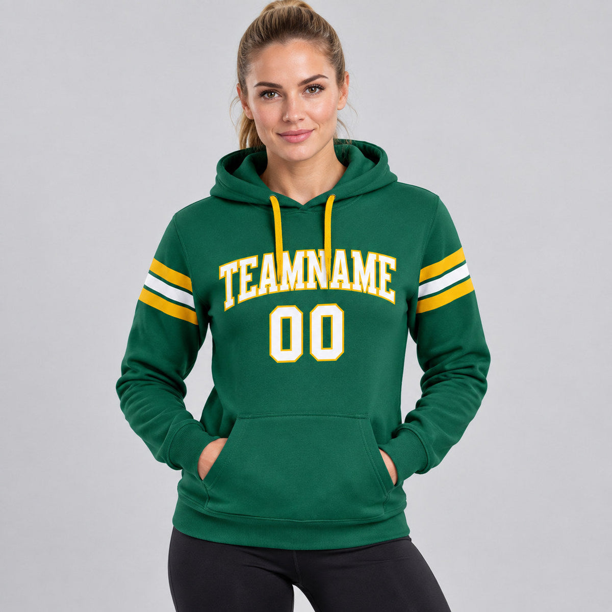 Custom Kelly Green Football Pullover Hoodie with White and Gold Lettering worn by female model