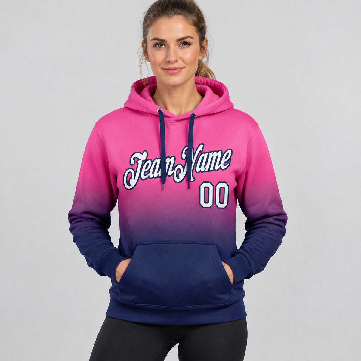 Custom Pink Fade Pullover Hoodie with White and Navy Lettering worn by female model