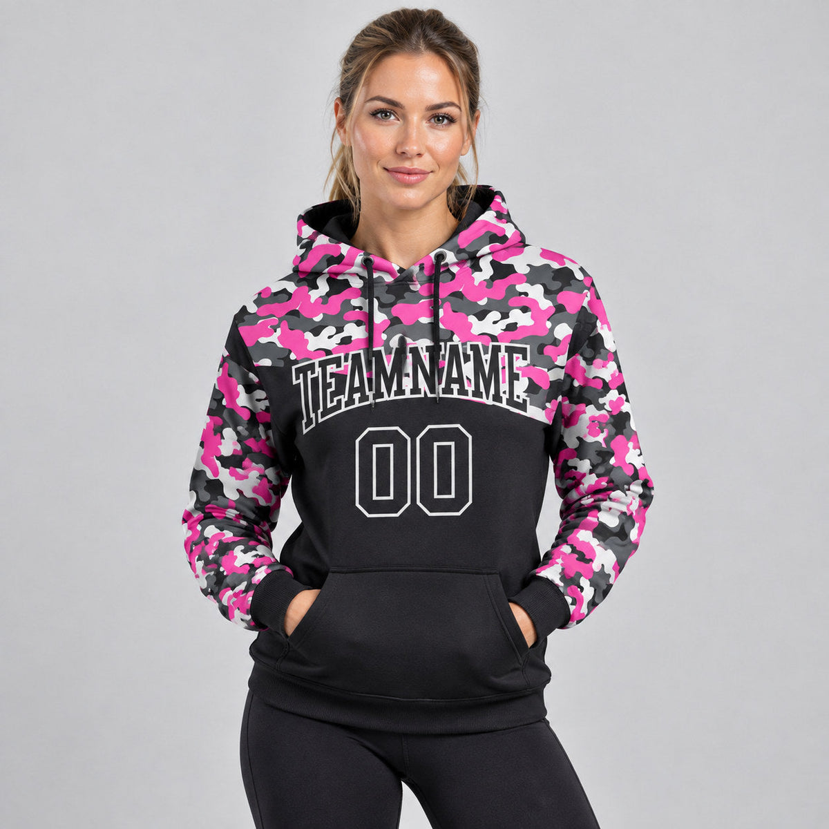 Custom Black Camo Salute To Service Pullover Hoodie with Pink and Steel Gray Lettering worn by female model