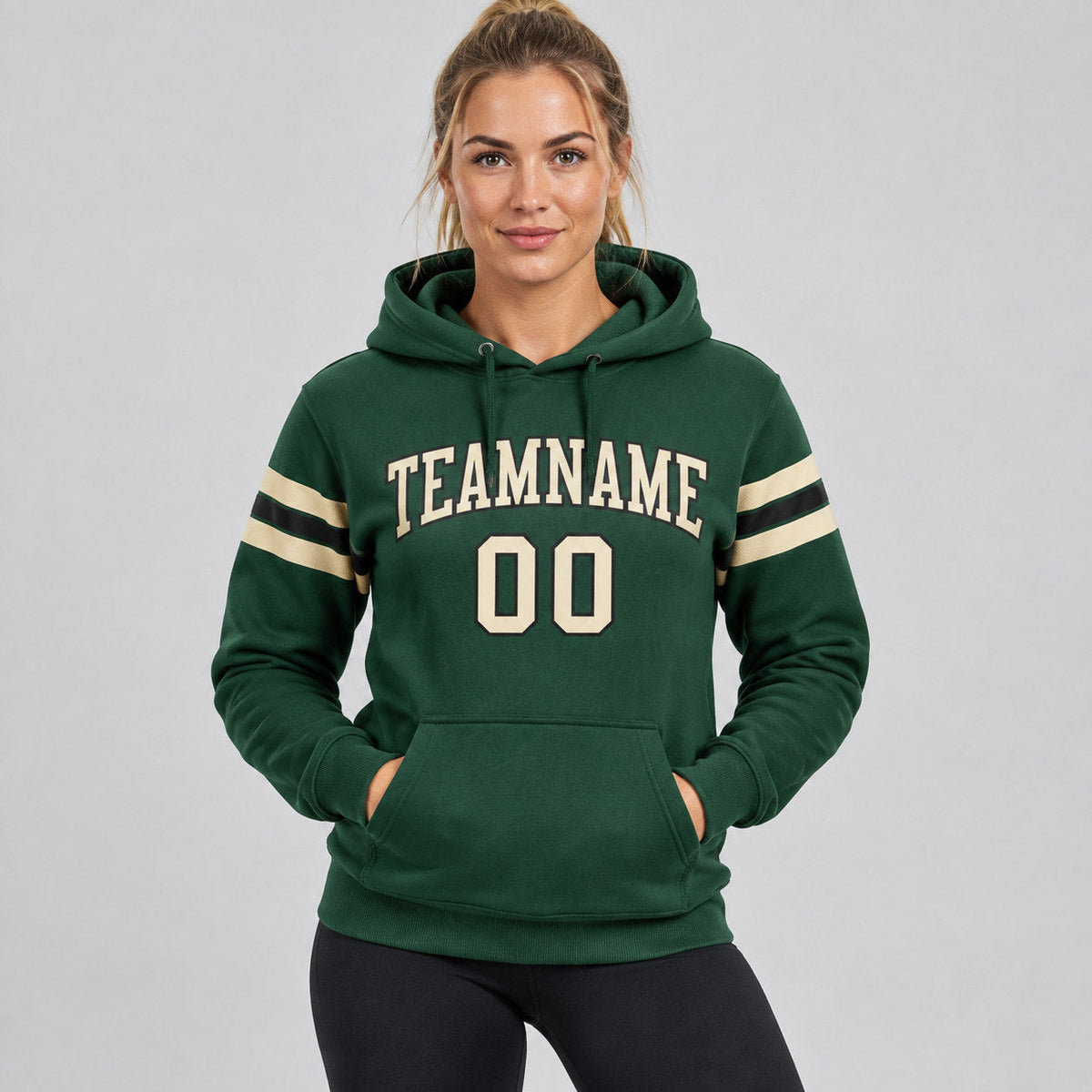 Custom Green Football Pullover Hoodie with City Cream and Black Lettering worn by female model