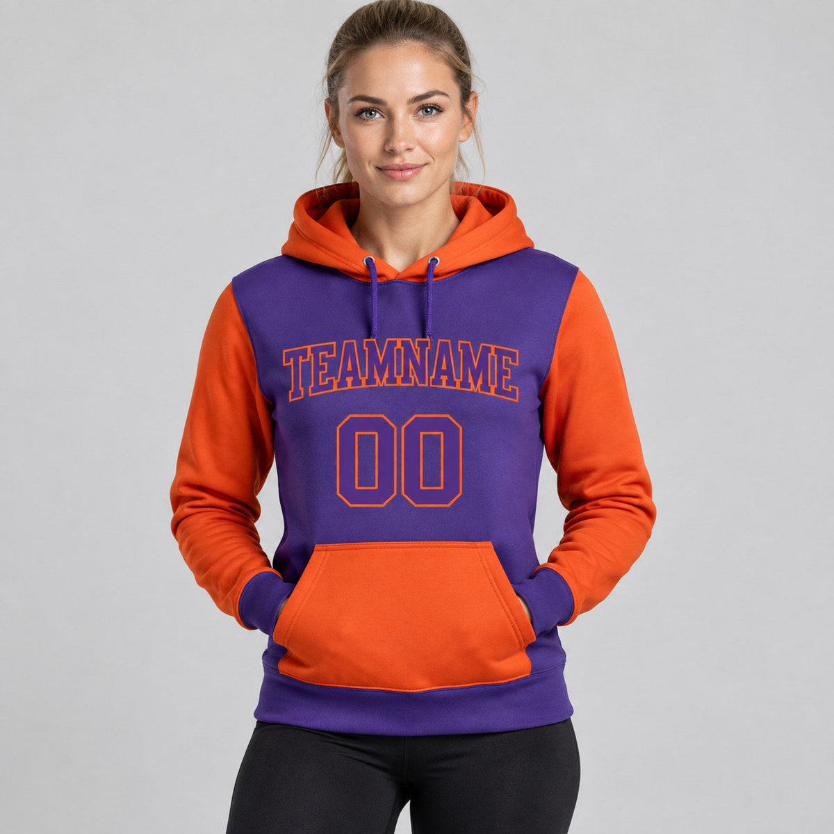 Custom Purple Pullover Hoodie with Purple and Orange Lettering Design 0179 worn by female model