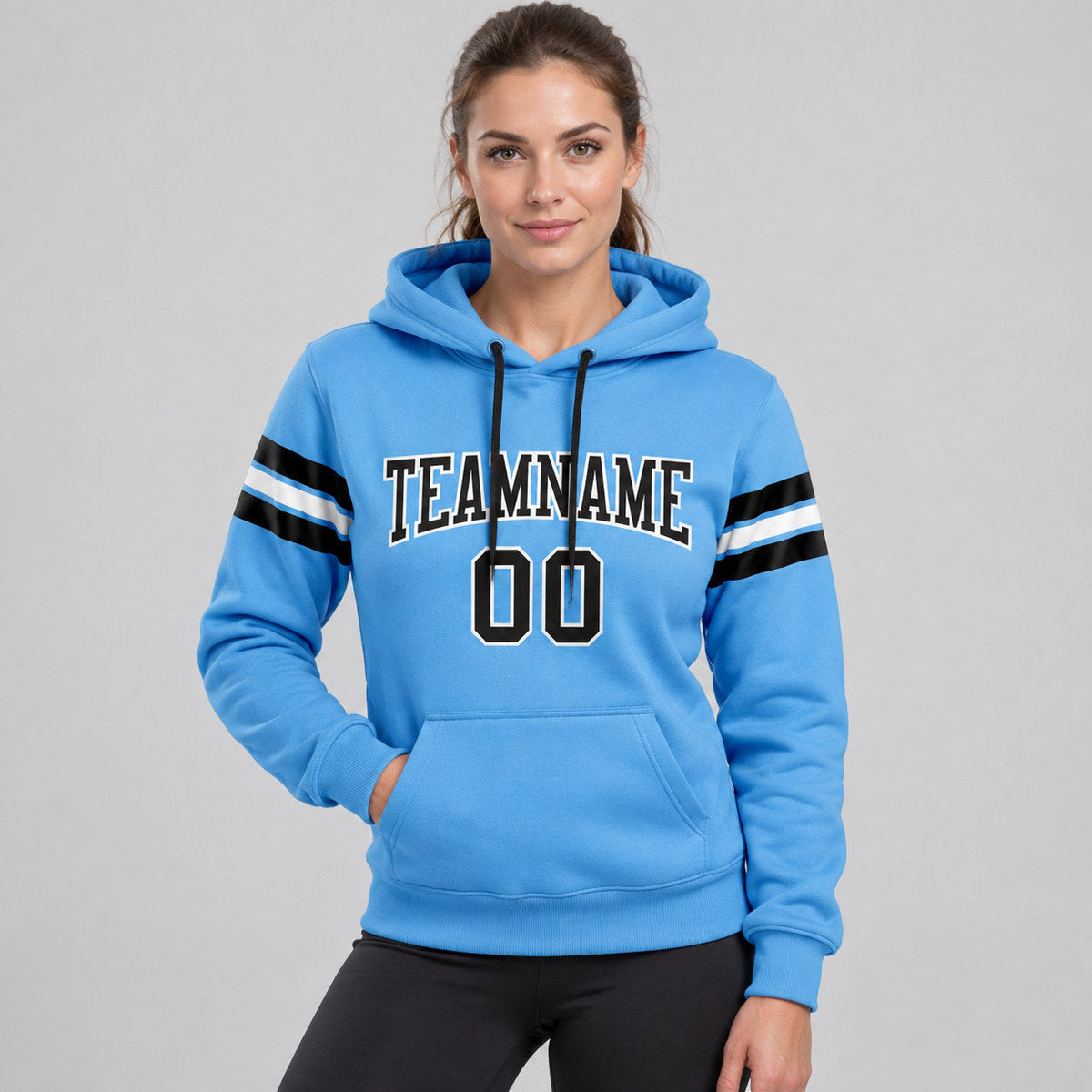 Custom Powder Blue Football Pullover Hoodie with Black and White Lettering worn by female model