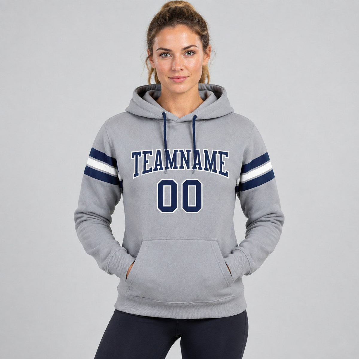 Custom Gray Football Pullover Hoodie with Navy and White Lettering worn by female model