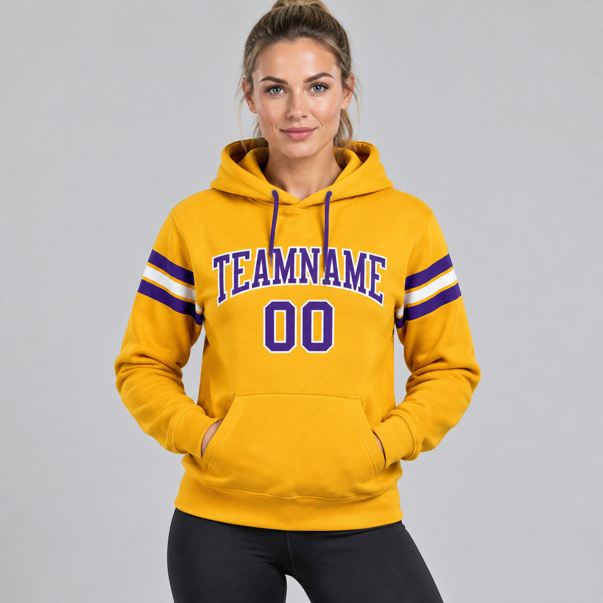 Custom Gold Football Pullover Hoodie with Purple and White Lettering worn by female model