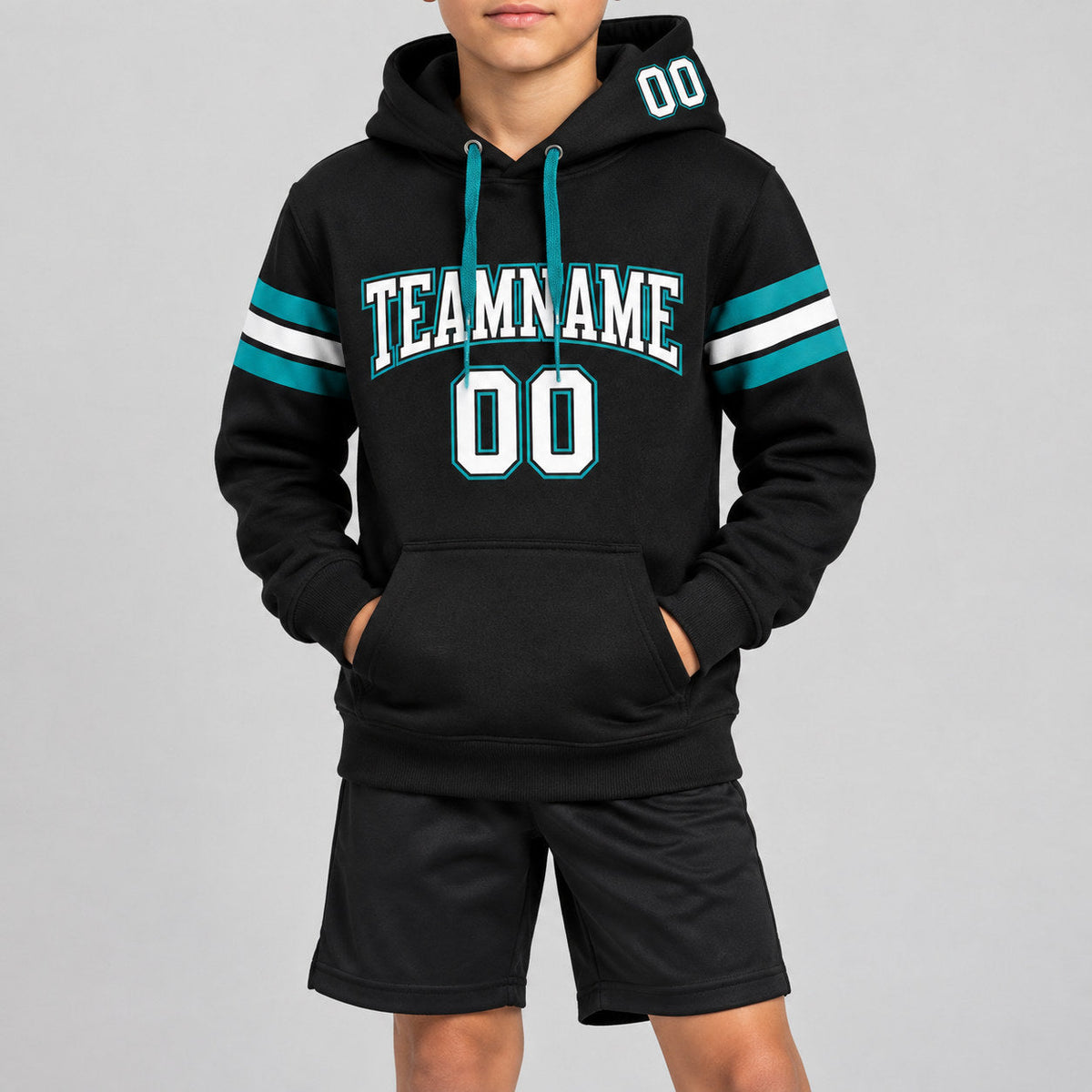 Custom Black Football Pullover Hoodie with White and Aqua Lettering youth size worn by child model