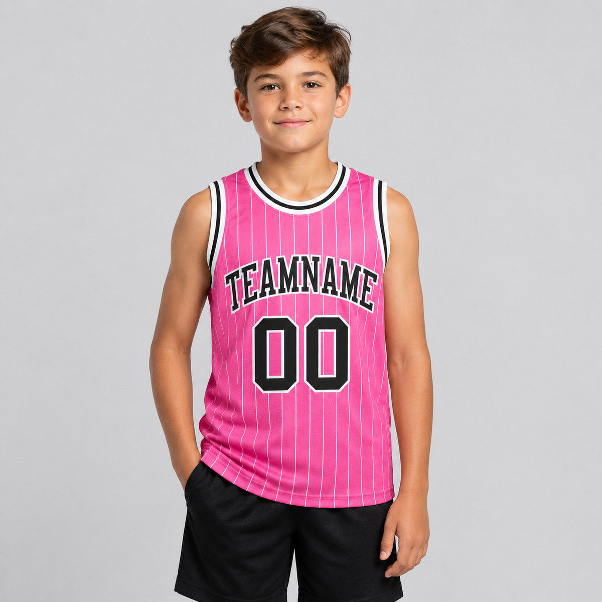 Custom Pink and White Pinstripe Authentic Basketball Jersey with Black and White Lettering youth size worn by child model