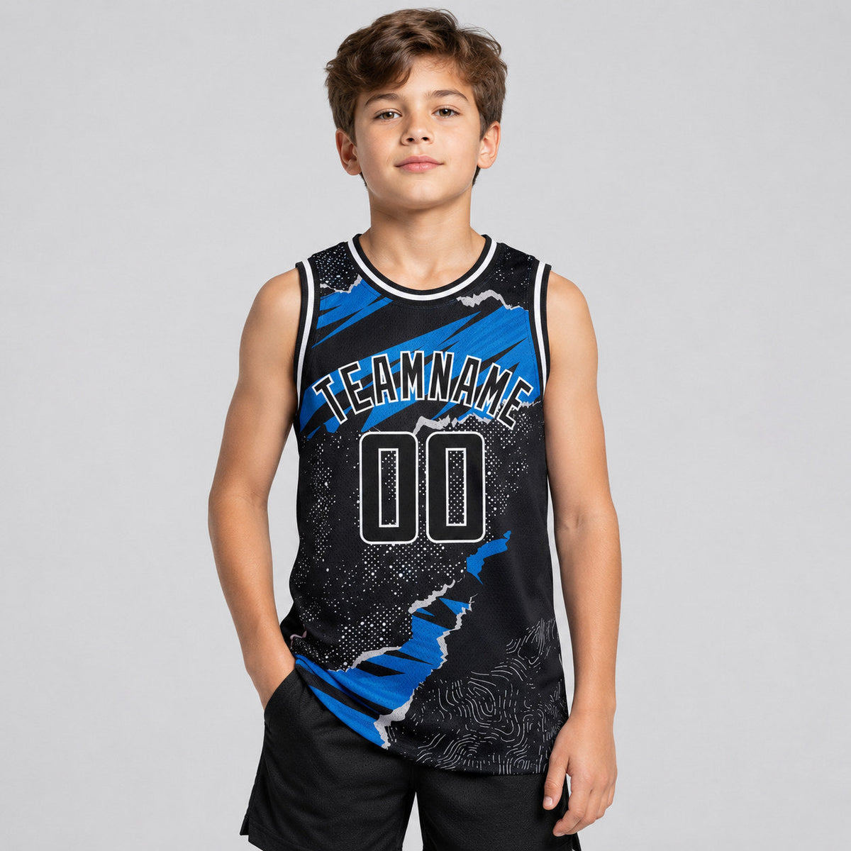 Custom Black Torn Paper Authentic Basketball Jersey with Blue and White Lettering youth size worn by child model