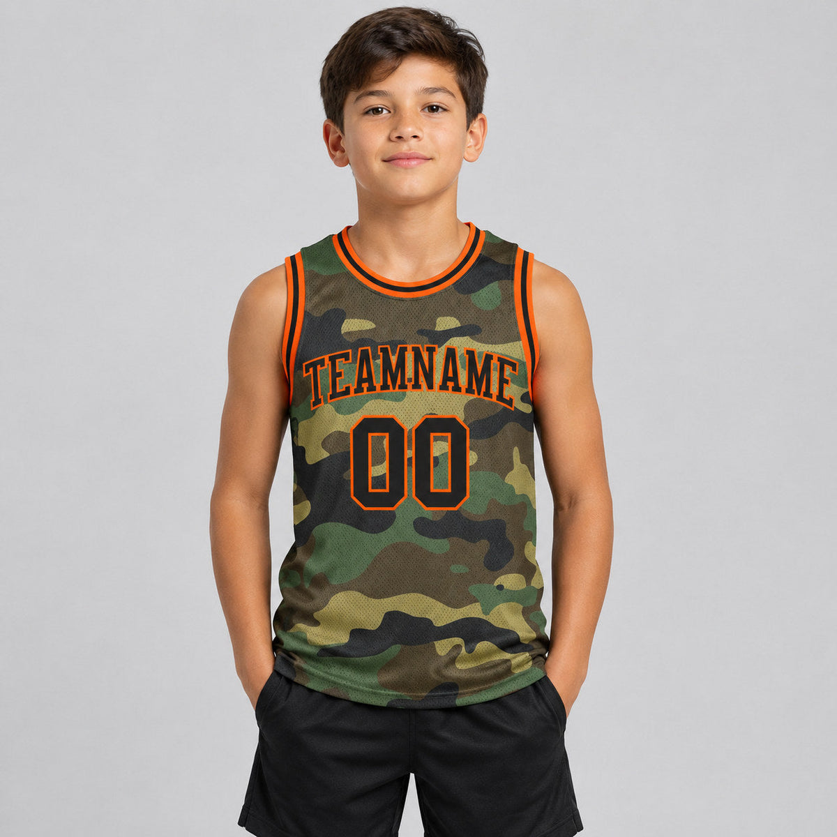 Custom Black and Orange Camo Salute To Service Authentic Basketball Jersey youth size worn by child model