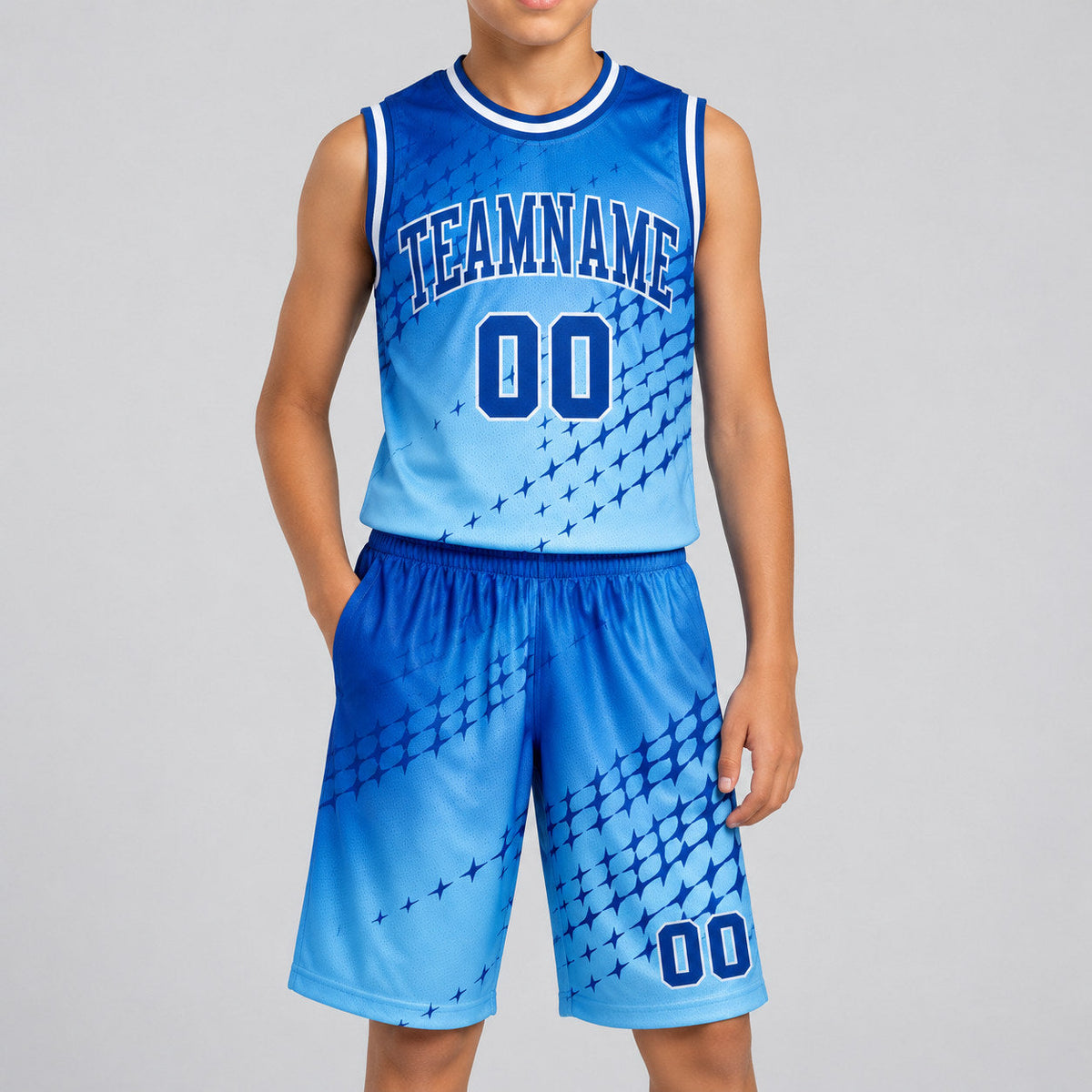 Custom Blue Round Neck Sublimated Basketball Jersey with Royal and Light Blue Lettering youth size worn by child model