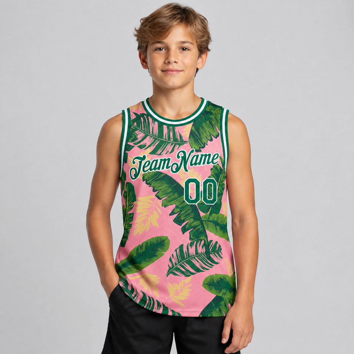 Custom Medium Pink Tropical Hawaii Leaves Basketball Jersey with Kelly Green and White Lettering youth size worn by child model