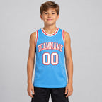 Custom Light Blue Authentic Throwback Basketball Jersey with White and Red Lettering Design 0386 youth size worn by child model