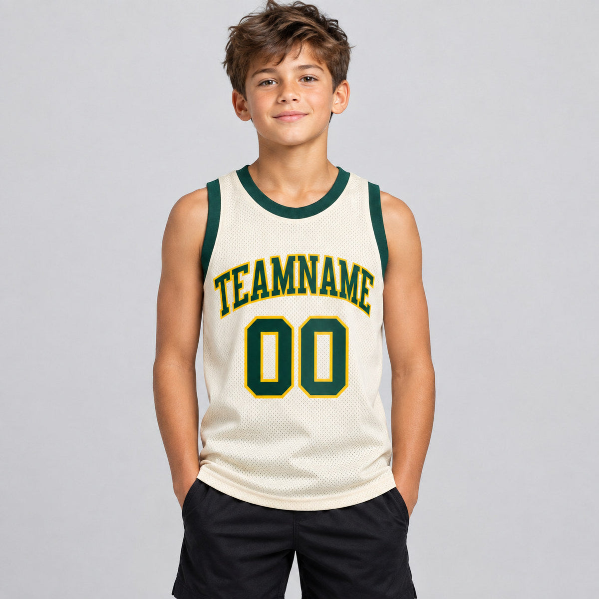 Custom Cream Authentic Throwback Basketball Jersey with Green and Gold Lettering youth size worn by child model