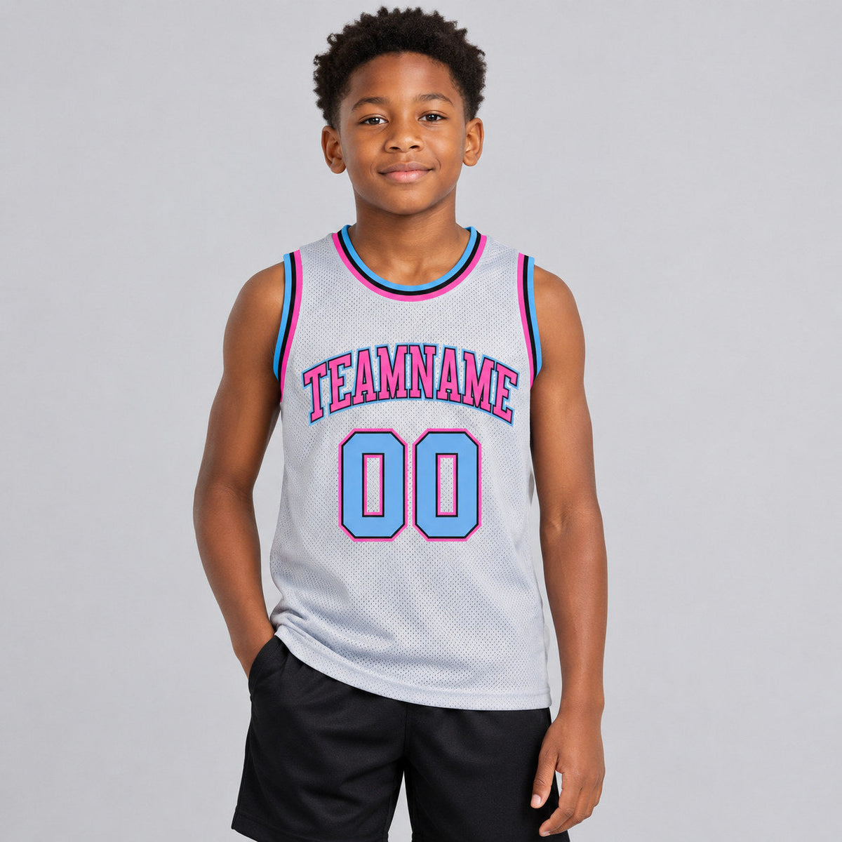 Custom Gray Authentic Throwback Basketball Jersey with Light Blue and Pink Lettering youth size worn by child model